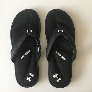 Man’s Under Armour padded flip flops.